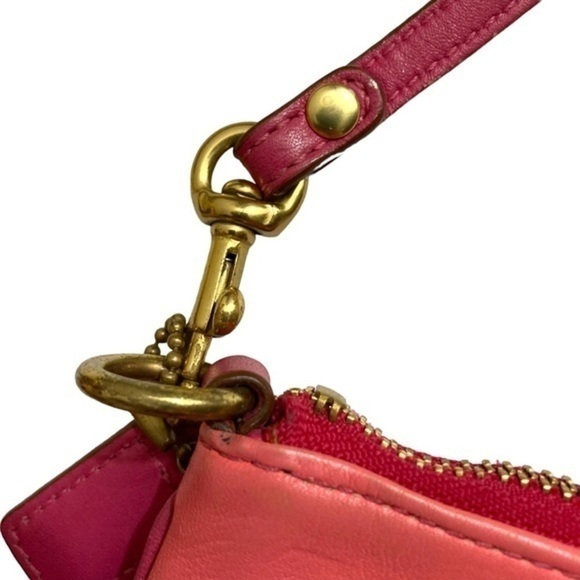 Coach pink peach colorblock wristlet mini clutch bag